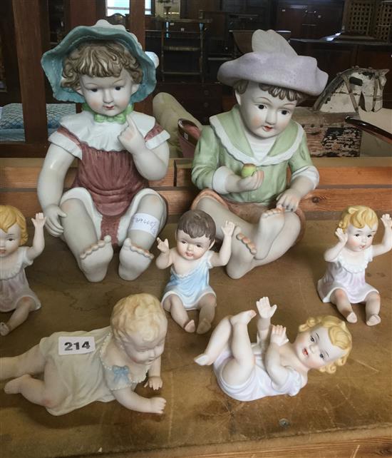 2 large bisque piano babies & 5 others